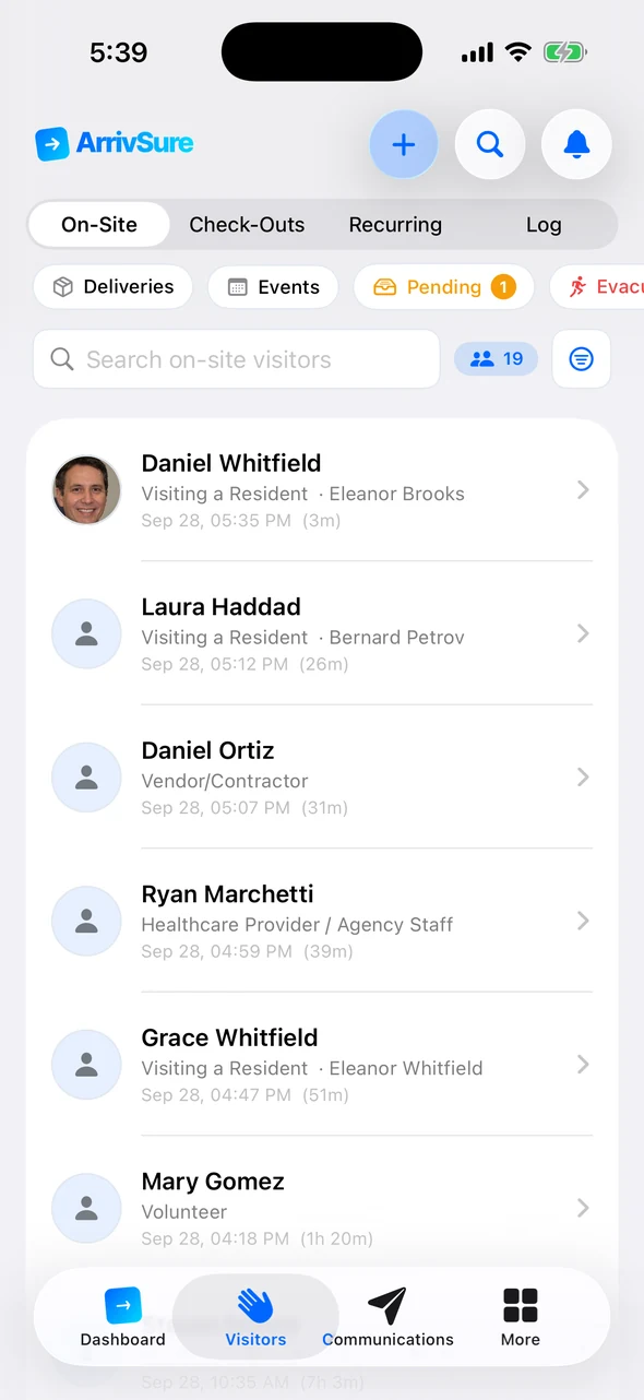 Companion app on-site list with each visitor’s purpose and time, and an Evacuation shortcut